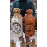 Two 19th C. stoneware ginger beer bottles - Thwaites of Dublin and J Donohoe Enniscorthy {19 cm H