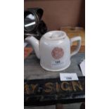 GNR Co of Ireland ceramic teapot. Dunne and Bennett Co Manufacturers. {8 cm H x 14 cm W x 9 cm D}.