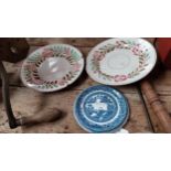 Two brush ware ceramic plates and willow pattern teapot stand {23 Dia. And 16 Dia.}.