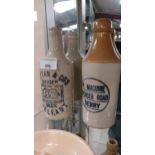 Two 19th C. stoneware ginger beer bottles - Grattan and Co Belfast {19 cm H x 7 cm Dia.} and P