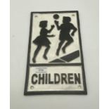 Children At Play cast iron advertising sign. { 29cm H X 17cm W }.