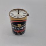 Guinness advertising clock in the form of a beer can. { 6cm H X 4cm Dia }.