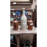 Two 19th Stoneware ink bottles - Gleeson of Dublin and another. {16 cm H x 7 cm Dia.} and {28 cm H x
