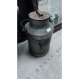 Metal creamery can {40 cm H x 25 cm Dia.}.