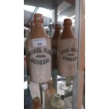 Two 19th C. stoneware ginger beer bottles - Micheal Flood Donegal and John Gallen Donegal. {20 cm