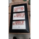Framed set of Bank of England and Bank of Scotland 10 shilling notes. {26 cm H x 10 cm W}.