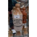 D McDevitt Letterkenny 19th C. stoneware ginger beer bottle. {19 cm H x 7 cm Dia.}.