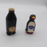 Guinness advertising plastic Penguin { 8cm H X 4cm Dia } & bottle mounted on feet. { 10cm H X 3cm