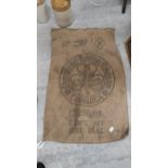 2 CWT Irish sugar bag as Gaeilge. {109 cm H x 70 cm W}.