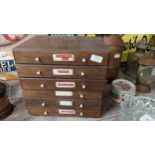 Stained pine bank of drawers {31cm H x 33cm W x 25cm D}