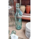 Hugh Ruddy and Co Ballina glass mineral bottle. {23 cm H x 6 cm Dia.}.