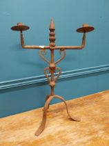 Wrought iron candle holder {54 cm H x 38 cm W x 24 cm D}.