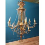 Good quality gilded metal ten branch chandelier with cut crystal droplets in the Rocco manner {138