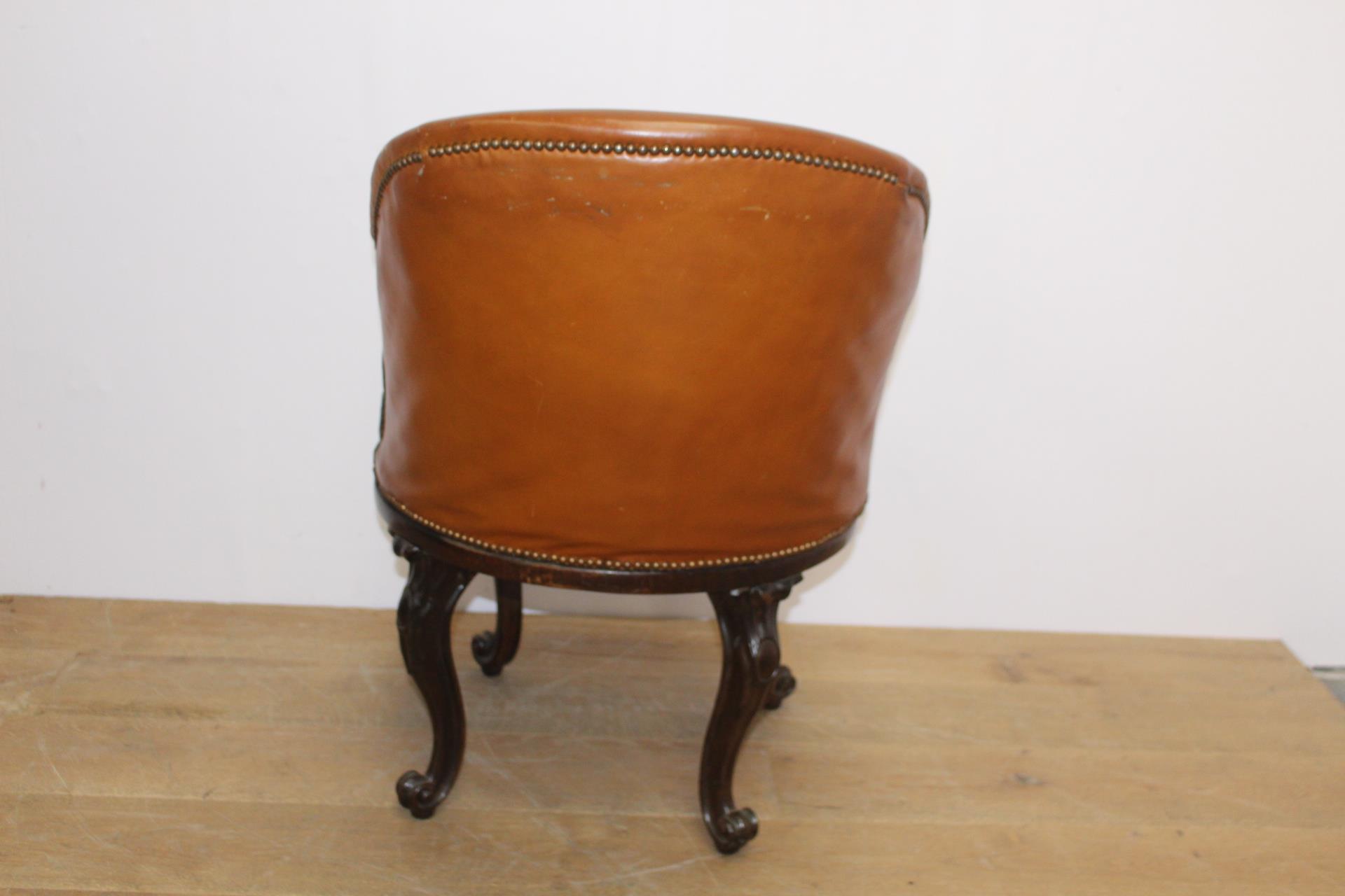Leather upholstered mahogany swivel tub chair raised on cabriole legs {H 86cm x W 56cm x D 77cm }. - Image 2 of 3