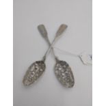 Pair of Irish Georgian silver berry spoons the fiddle pattern with bright cut decoration to the