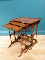 Good quality Edwardian mahogany nest of three table raised on turned columns and platform feet {56