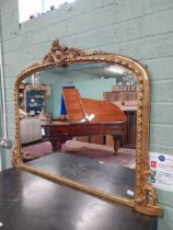 Good quality giltwood overmantle mirror in the Victorian style {104 cm H x 140 cm W}.
