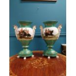 Pair of decorative ceramic vases decorated with Hunting Scenes. {49 cm H x 29 cm W x 12 cm D}.