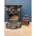 Art deco cast iron stove {H 74cm x W 59cm x D 50cm }.