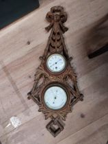 19th C. carved oak barometer and clock with leaf decoration. {80 cm H x 30 cm W}.