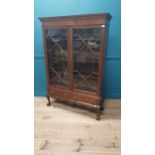 Good quality Edwardian mahogany display cabinet on stand with two astral glazed doors above two
