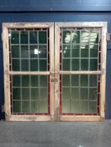 Pair of leaded stain glass windows with brass locks {Each H 98cm x W 50cm x D 3cm }.