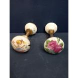 Two sets of decorative porcelain and brass door knobs {Dia 5cm x D 15cm}.
