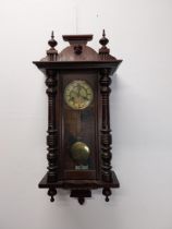 Early 20th C. mahogany Vienna wall clock with enamel dial {82 cm H x 37 cm W x 18 cm D}.