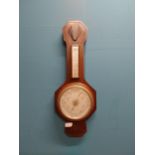 Art Deco mahogany barometer with silver dial. {63 cm H x 24 cm W}.