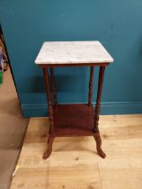 Late 19th C. mahogany plant stand with marble top on four turned columns on platform base on four