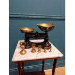 Brass and metal sweet scales with five weights. {20 cm H x 28 cm W x 17 cm D}.