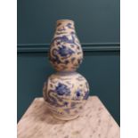 Chinese blue and white double-gourd vase bearing the Qianlong seal {36 cm H x 18 cm Dia.}.