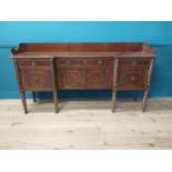 19th C. Irish mahogany side board with gallery back and three drawers in the frieze above four blind