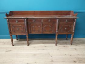 19th C. Irish mahogany side board with gallery back and three drawers in the frieze above four blind