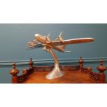 Early 20th C. chrome desk model of a plane {30 cm H x 60 cm W x 36 cm D}.