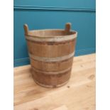 Early 20th C. oak and metal bound log bucket {44 cm H x 84 cm Dia.}.