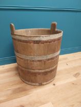 Early 20th C. oak and metal bound log bucket {44 cm H x 84 cm Dia.}.