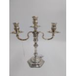 English silver two branch candelabra with detachable branch, knopped stem and raised on stepped