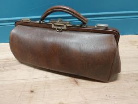 Early 20th C. leather gladstone bag {26 cm H x 47 cm W x 16 cm D}.