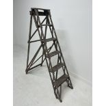 Pine step ladder {H 150cm x W 42cm x D open 110cm }.