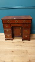 Irish Georgian mahogany low boy with central long drawer above six short drawers raised on bracket