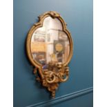 Victorian giltwood wall mirror with three candelabras {85 cm H x 52 cm W x 14 cm D}.