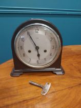 1940's Bakelite mantle clock with silver dial. {20 cm H x 22 cm W x 13 cm D}.