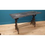 19th C. decorative cast iron table with ebonised top {73 cm H x 121 cm W x 54 cm D}.