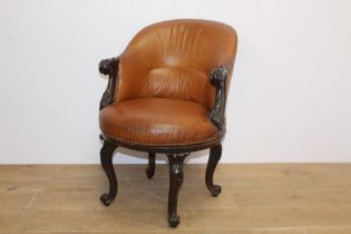Leather upholstered mahogany swivel tub chair raised on cabriole legs {H 86cm x W 56cm x D 77cm }.