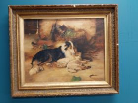 Dog and Lamb oil on canvas mounted in gilt frame. {54 cm H x 64 cm W}.