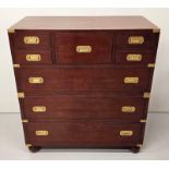 Exceptional quality walnut chest of drawers with brass mounts and handles in the campaign style {105