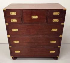 Exceptional quality walnut chest of drawers with brass mounts and handles in the campaign style {105