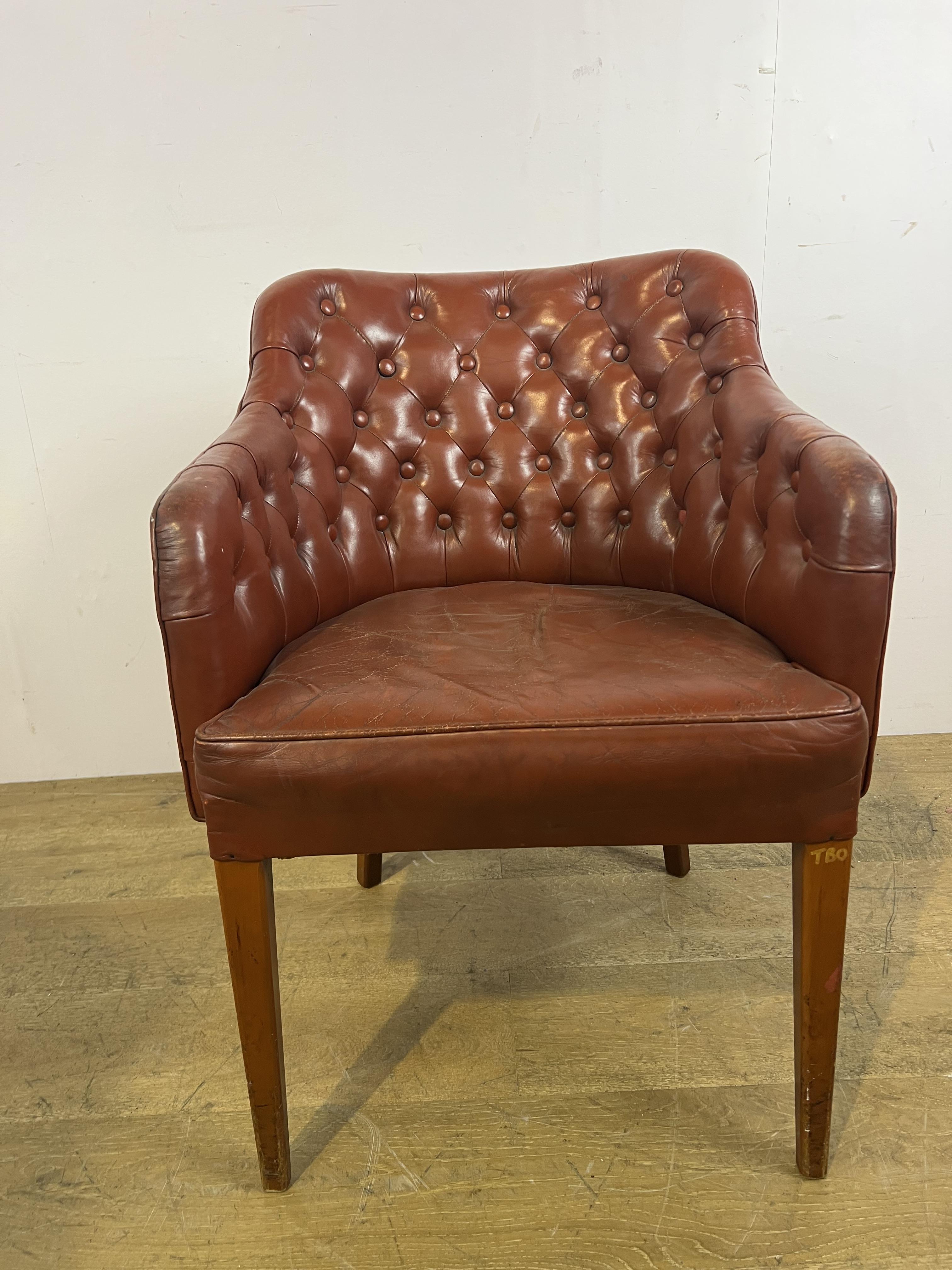 Hand dyed leather deep buttoned tub chair raised on square tapered legs {H 80cm x W 62cm x D