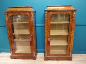 Pair of exceptional quality French burr walnut pier cabinets with ormolu mounts raised on platform